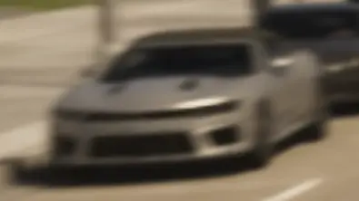 یک Vigero ZX Convertible با سقف بالا.